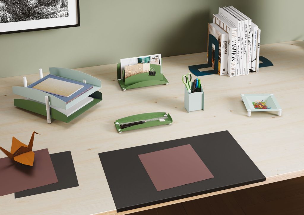 Axiane accessories on a work surface (letter trays, pencil holder, pocket tray, desk pad).