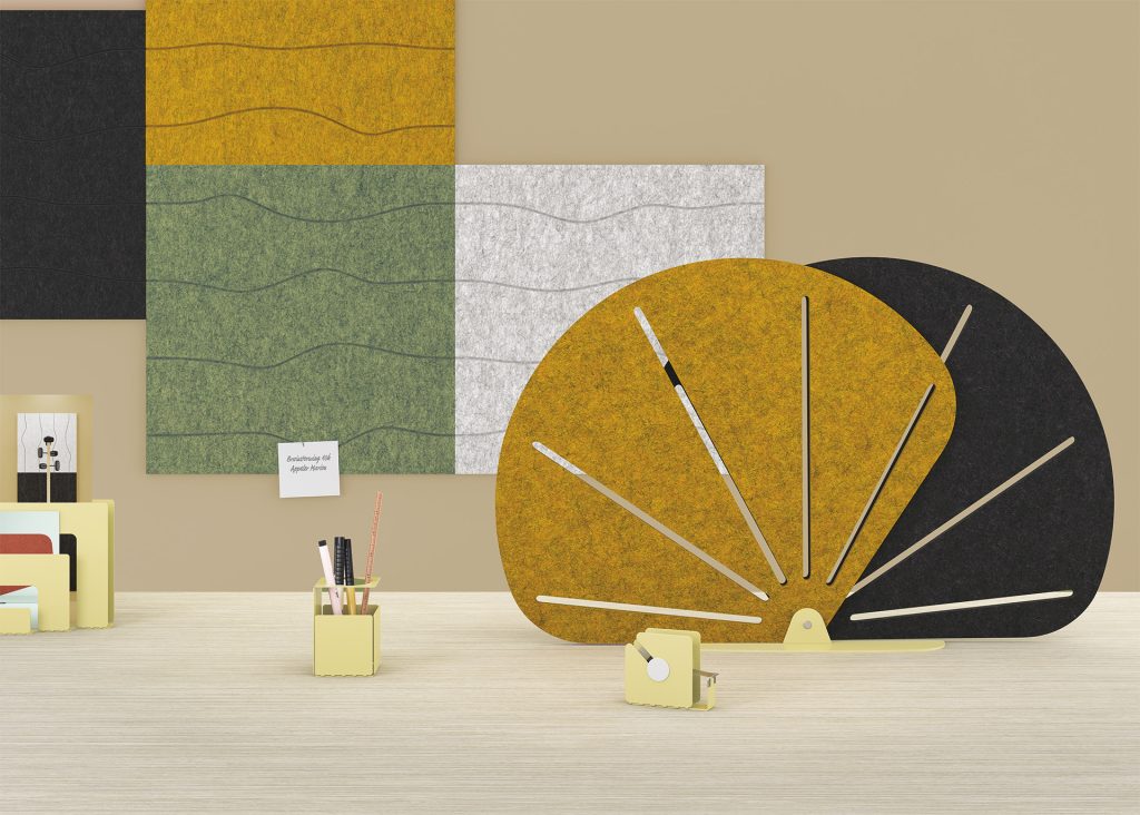 Worktop against a wall with small, modular, colored PET felt acoustic screens.