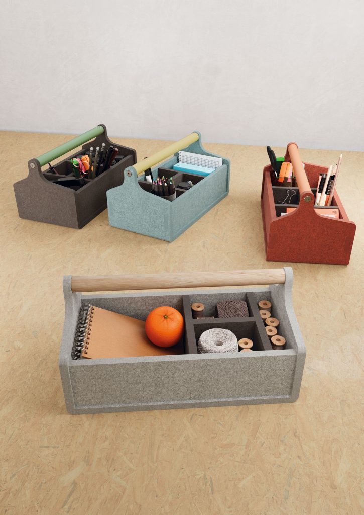 Top view of four pocket-sized PET felt toolboxes in various colors. The toolbox compartments are filled with items/objects.