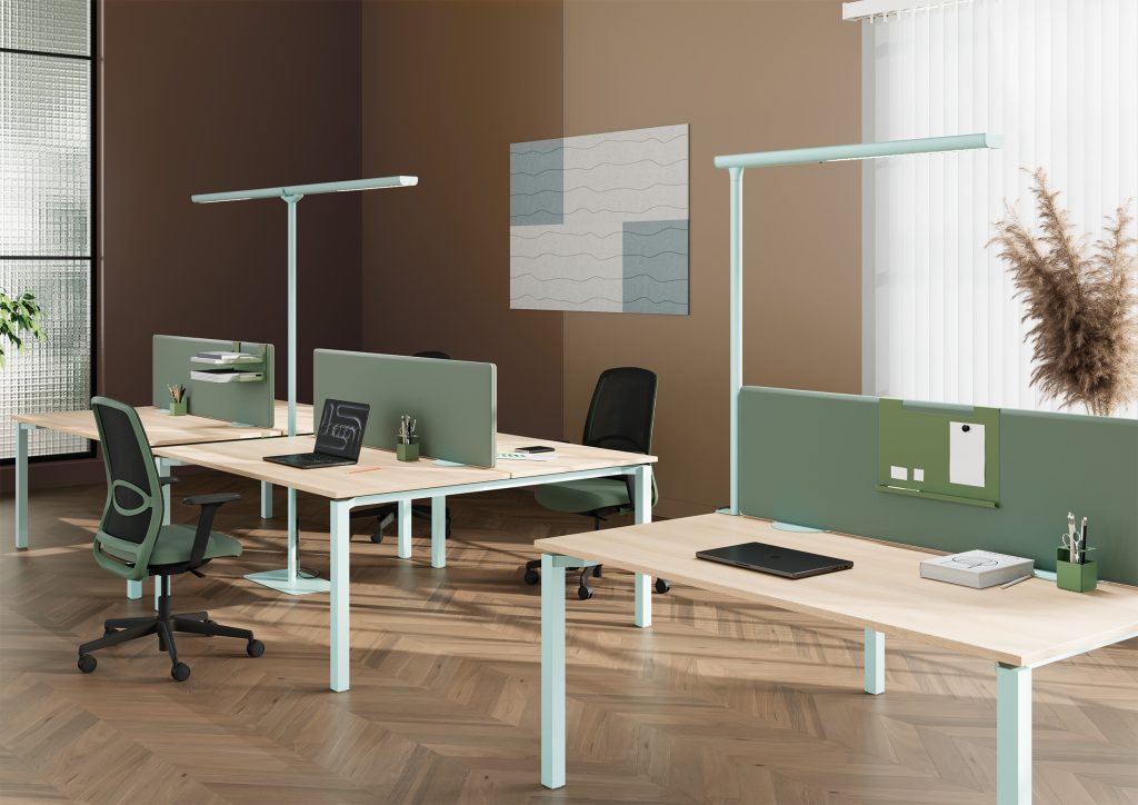 Room with two desks and two floor lamps, one double-headed and one clamp-on. The floor lamps are light blue and match the color of the desk legs.